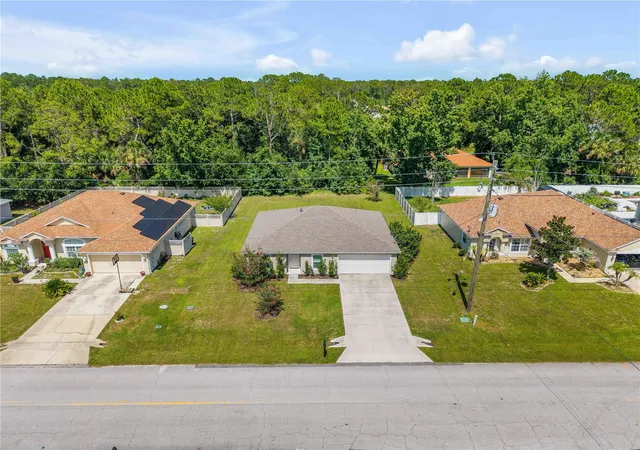 Photo 3 of Single family home for sale at 176 Pine Grv Dr, Palm Coast, FL 32164 | MLS# NS1088812 | Listing updated on 2026-10-17