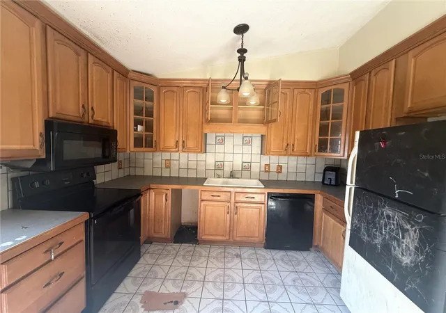 Photo 2 of Single family home for sale at 14705 Penguin Pl, Tampa, FL 33625 | MLS# W7887947 | Listing updated on 2026-09-03