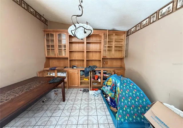 Photo 3 of Single family home for sale at 14705 Penguin Pl, Tampa, FL 33625 | MLS# W7887947 | Listing updated on 2026-09-03