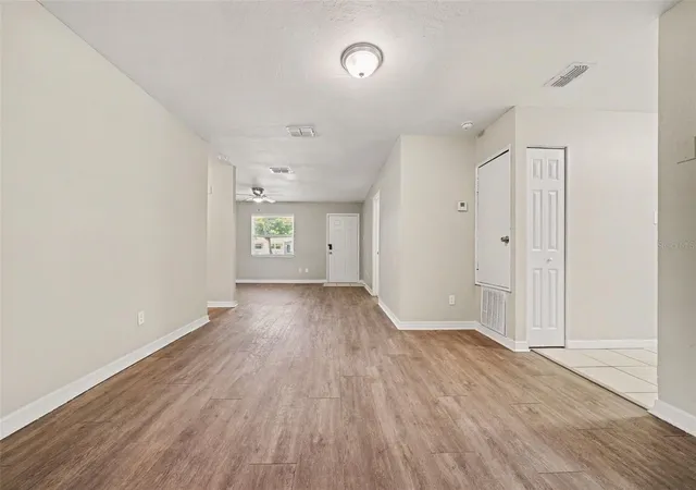 Photo 4 of Single family home for sale at 1895 S Ivey Ln, Orlando, FL 32811 | MLS# O6427853 | Listing updated on 2026-07-29