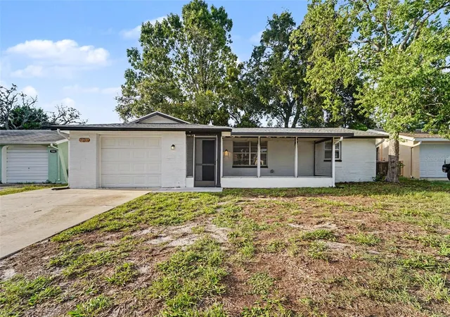Single family home for sale at 7207 Sandalwood Dr, Port Richey, FL 34668 | MLS# O6427854 | Listing updated on 2026-10-06
