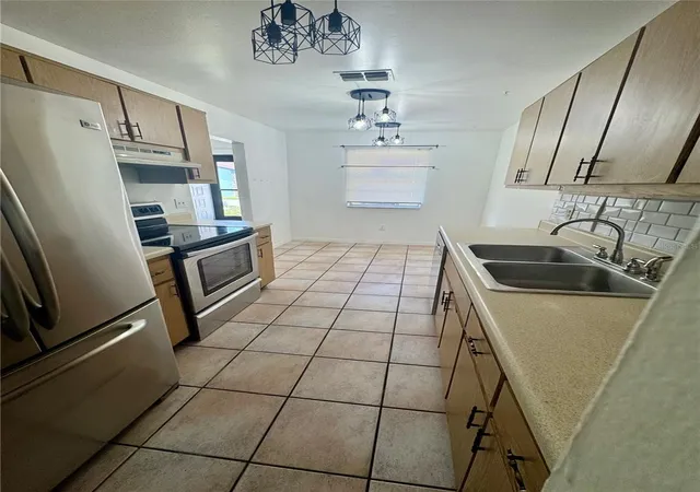 Photo 3 of Sale Pending at 1220 Cheney Hwy #D, Titusville, FL 32780 | MLS# O6427931 | Listing updated on 2026-10-02