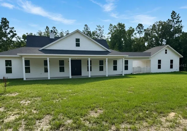 Single family home for sale at 5040 NE 48th Court, HIGH SPRINGS, FL 32643 | MLS# TB8532522