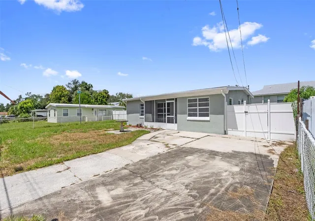 Photo 2 of Single family home for sale at 7710 Coral Vine Ln, Tampa, FL 33619 | MLS# TB8532548 | Listing updated on 2026-09-05