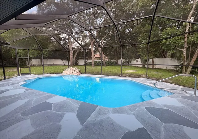Photo 3 of Single family home for sale at 18608 Autumn Lake Blvd, Hudson, FL 34667 | MLS# W7887965 | Listing updated on 2026-09-25