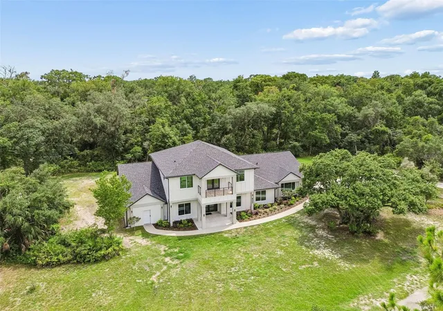 Photo 3 of Single family home for sale at 12000 Golden Valley Dr, New Port Richey, FL 34654 | MLS# W7887969 | Listing updated on 2026-08-11