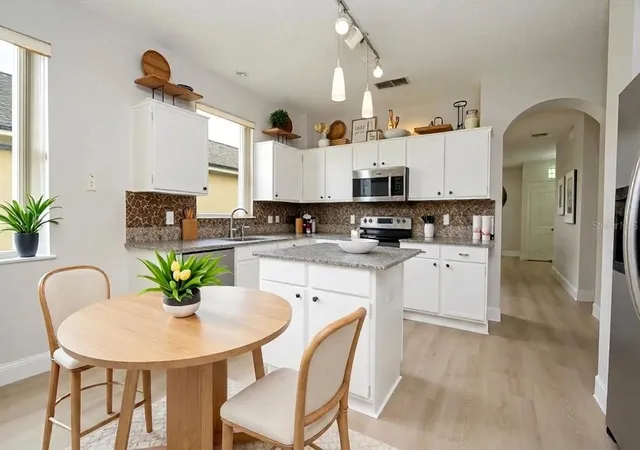 Photo 4 of Single family home for sale at 13827 Hawkeye Dr, Orlando, FL 32837 | MLS# O6427987 | Listing updated on 2026-08-10