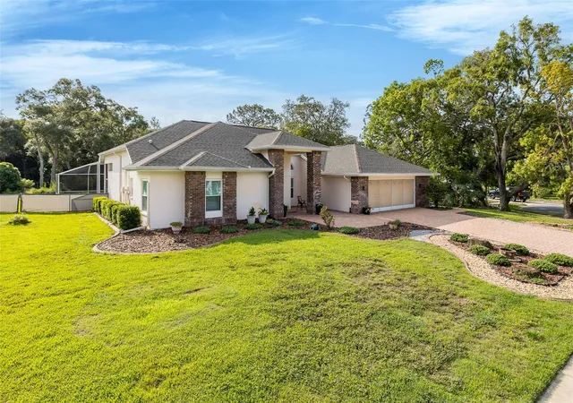 Photo 3 of Single family home for sale at 18822 Majestic Oak Ct, Hudson, FL 34667 | MLS# W7887971 | Listing updated on 2026-09-17