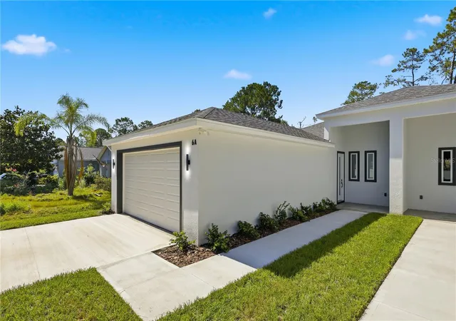 Listing Photo 3 - Condo for sale in building located at 6 Unicorn Ct, PALM COAST, FL 32164 - Unit #A & B