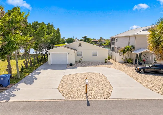 Photo 1 of Single family home for sale at 3385 Holly Springs Dr, Hernando Beach, FL 34607 | MLS# TB8532668 | Listing updated on 2026-09-29