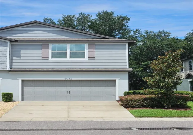 Photo 1 of Townhouse for sale at 5012 Sylvester Loop, Tampa, FL 33610 | MLS# O6428073 | Listing updated on 2026-10-01
