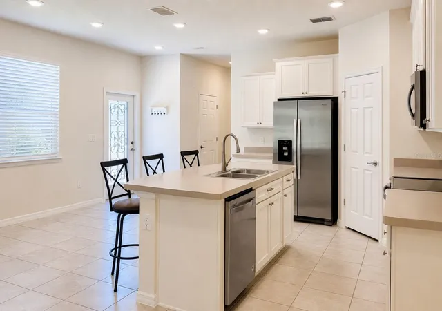 Photo 3 of Townhouse for sale at 5012 Sylvester Loop, Tampa, FL 33610 | MLS# O6428073 | Listing updated on 2026-10-01
