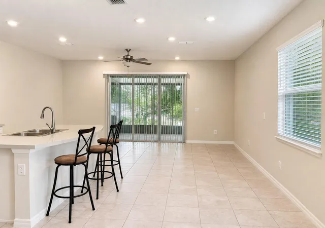 Photo 3 of Townhouse for sale at 5012 Sylvester Loop, Tampa, FL 33610 | MLS# O6428073 | Listing updated on 2026-10-01