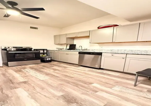 Photo 3 of Single family home for sale at 4810 Deauville Dr, Orlando, FL 32808 | MLS# TB8532731 | Listing updated on 2026-09-17