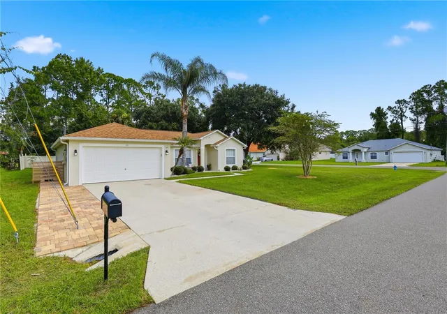 Photo 1 of Single family home for sale at 23 Port Ln, Palm Coast, FL 32164 | MLS# FC320197 | Listing updated on 2026-09-22