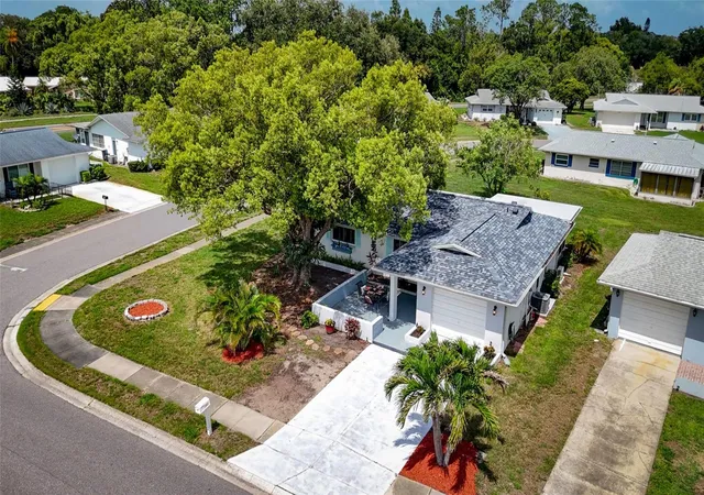 Photo 3 of Single family home for sale at 1496 Queen Anne Dr, Palm Harbor, FL 34684 | MLS# TB8532761 | Listing updated on 2026-09-13