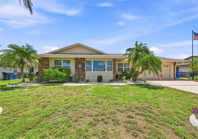 Photo 1 of Single family home for sale at 1405 Hacienda Dr, Sun City Center, FL 33573 | MLS# TB8532825 | Listing updated on 2026-10-07
