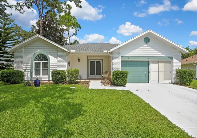 Photo 2 of Sale Pending at 7159 Crown Oaks Dr, Spring Hill, FL 34606 | MLS# W7887986 | Listing updated on 2026-10-07