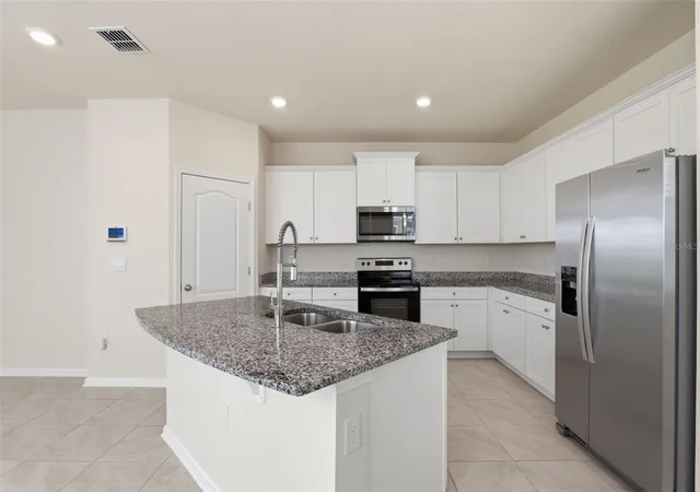 Photo 4 of Townhouse for sale at 108 Redbud Rd, Palm Coast, FL 32137 | MLS# FC320209 | Listing updated on 2026-09-26