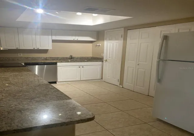 Photo 3 of Condo for sale at 9911 Turf Ct #2, Orlando, FL 32837 | MLS# O6428234 | Listing updated on 2026-07-31