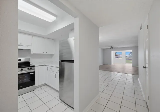 Photo 3 of Condo for sale at 4678 Marine Pkwy #105, New Port Richey, FL 34652 | MLS# W7887991 | Listing updated on 2026-07-27