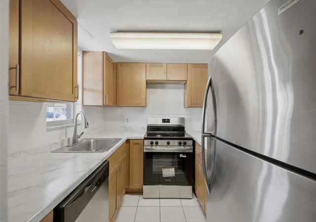 Photo 3 of Condo for sale at 5207 Turquoise Ln #101, New Port Richey, FL 34652 | MLS# W7887992 | Listing updated on 2026-10-07