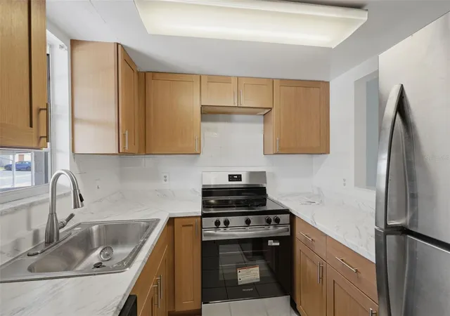Photo 4 of Condo for sale at 5207 Turquoise Ln #101, New Port Richey, FL 34652 | MLS# W7887992 | Listing updated on 2026-10-07