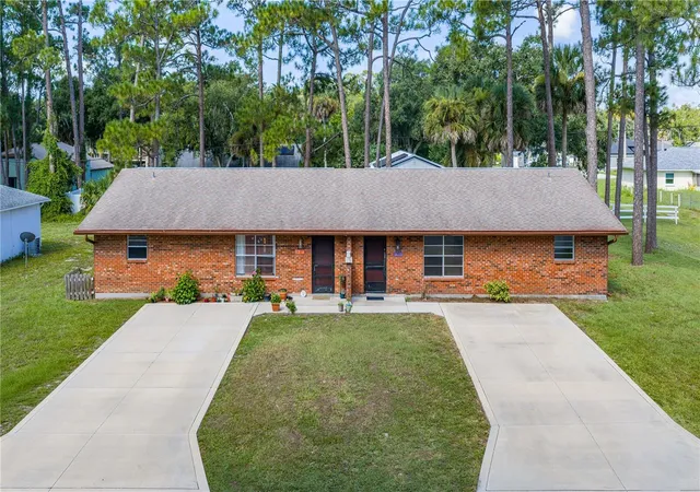 Photo 1 of Multi family home for sale at 2304 India Palm Dr, Edgewater, FL 32141 | MLS# NS1088839 | Listing updated on 2026-07-29