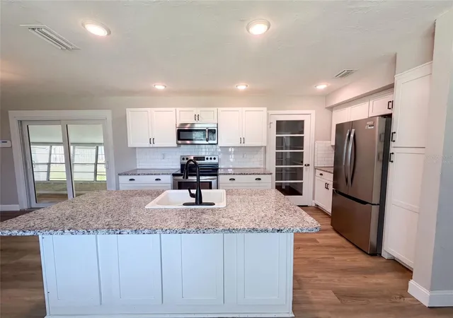 Photo 1 of Single family home for sale at 1521 W River Shore Way, Tampa, FL 33603 | MLS# O6428328 | Listing updated on 2026-10-30