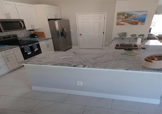 Photo 4 of Single family home for sale at 3985 SE 138th Place, Summerfield, FL 34491 | MLS# TB8533042 | Listing updated on 2026-08-24