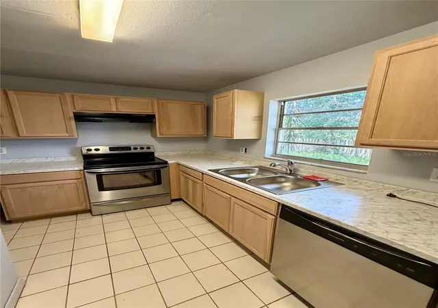 Photo 3 of Sale Pending at 1306 Dukes Dr, Tarpon Springs, FL 34689 | MLS# TB8533081 | Listing updated on 2026-08-27