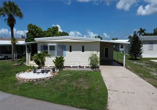 Photo 1 of Manufactured home for sale at 2100 Kings Hwy Trl #116, Port Charlotte, FL 33980 | MLS# C7528862 | Listing updated on 2026-10-07