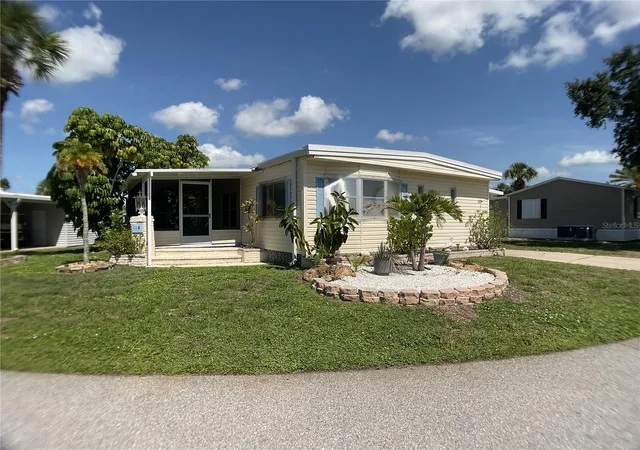 Photo 2 of Manufactured home for sale at 2100 Kings Hwy Trl #116, Port Charlotte, FL 33980 | MLS# C7528862 | Listing updated on 2026-10-07
