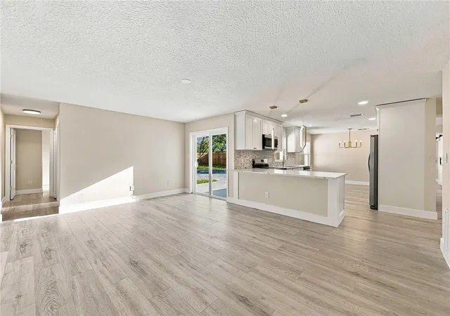 Photo 3 of Single family home for sale at 7015 Crestlake Dr, Orlando, FL 32819 | MLS# O6428433 | Listing updated on 2026-09-22