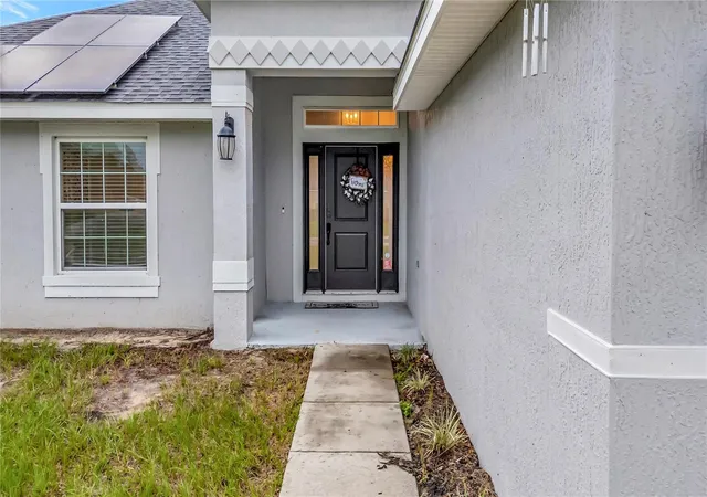 Photo 3 of Single family home for sale at 8241 Sw 132 Loop, Ocala, FL 34473 | MLS# OM729252 | Listing updated on 2026-09-29