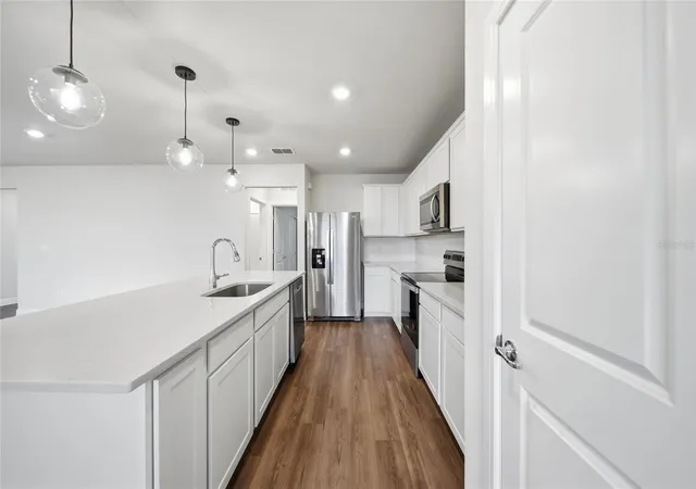 Photo 4 of Single family home for sale at 9018 Rally Spring Loop, Wesley Chapel, FL 33545 | MLS# TB8533176 | Listing updated on 2026-10-09
