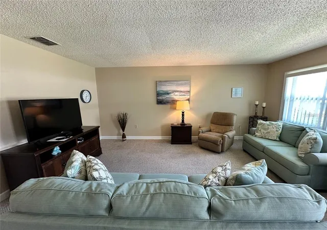 Photo 2 of Condo for sale at 11725 Boynton Ln #71A, New Port Richey, FL 34654 | MLS# W7888023 | Listing updated on 2026-09-01