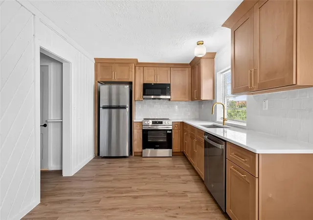 Photo 3 of Single family home for sale at 1202 E Caroline St, Tavares, FL 32778 | MLS# TB8533197 | Listing updated on 2026-09-25