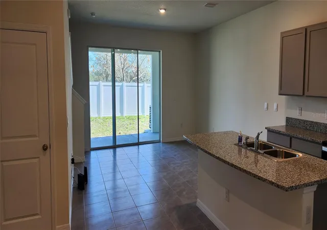 Photo 3 of Townhouse for sale at 9241 Rock Harbour Way, Tampa, FL 33637 | MLS# O6428560 | Listing updated on 2026-09-30