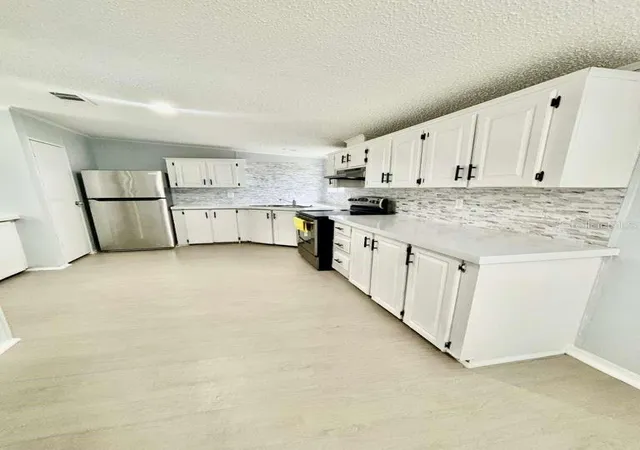 2nd image of 218 Diamond Acres Rd, Davenport, FL 33837 | MLS# O6428567