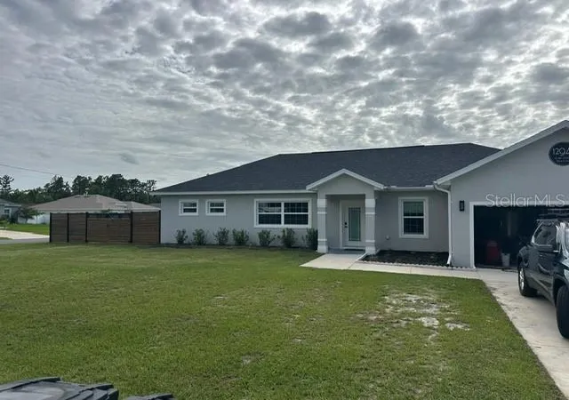 Photo 2 of Single family home for sale at 12942 Sw 70th Terrace, Ocala, FL 34473 | MLS# OM729282 | Listing updated on 2026-07-28