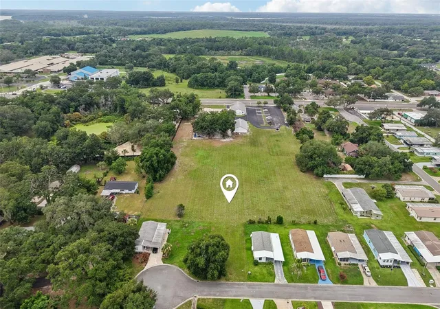 1st image of 2341 W Coach N Four Dr, Leesburg, FL 34748 | MLS# O6428638