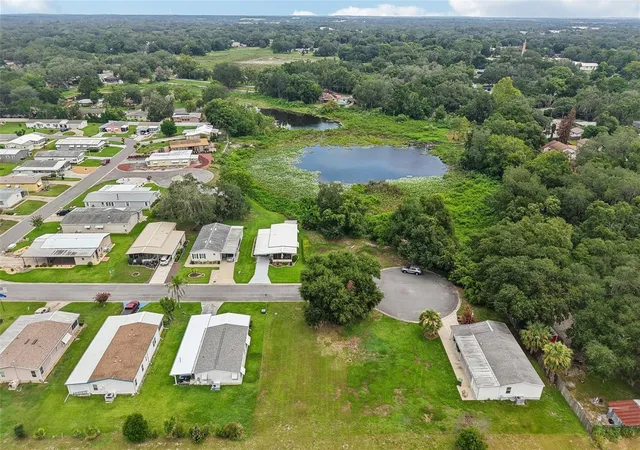 4th image of 2341 W Coach N Four Dr, Leesburg, FL 34748 | MLS# O6428638