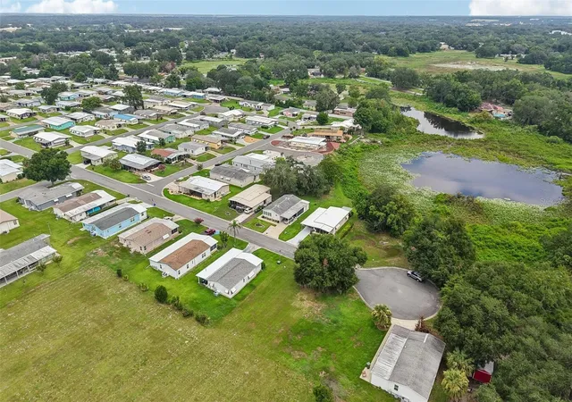 5th image of 2341 W Coach N Four Dr, Leesburg, FL 34748 | MLS# O6428638