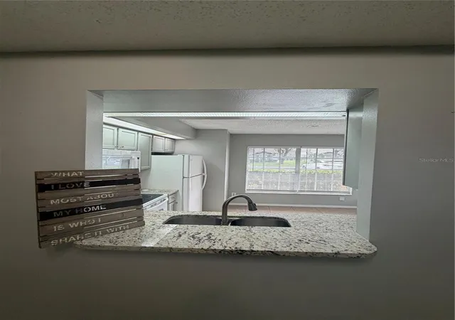 Photo 4 of Townhouse for sale at 14864 Laguna Beach Cir, Orlando, FL 32824 | MLS# O6428673 | Listing updated on 2026-07-28