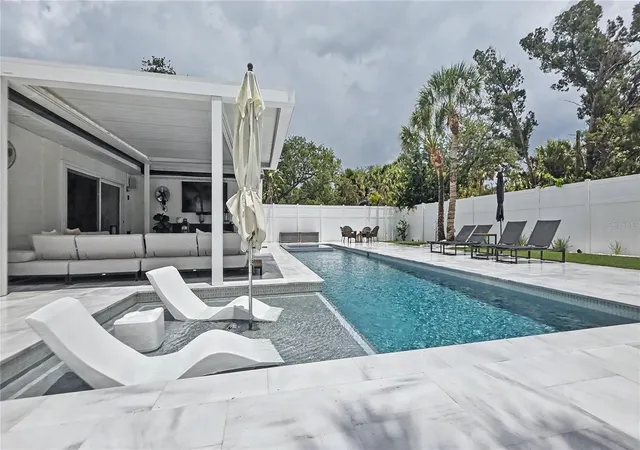 Photo 3 of Single family home for sale at 5143 Sandy Beach Ave, Sarasota, FL 34242 | MLS# TB8533327 | Listing updated on 2026-08-02