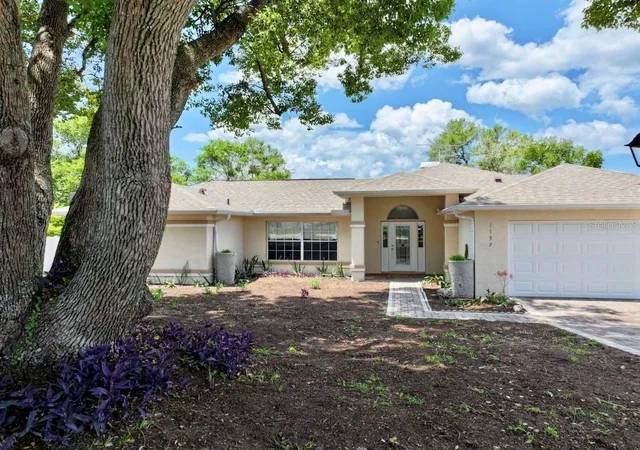 Photo 1 of Single family home for sale at 5137 Montford Cir, Spring Hill, FL 34606 | MLS# TB8533345 | Listing updated on 2026-10-15