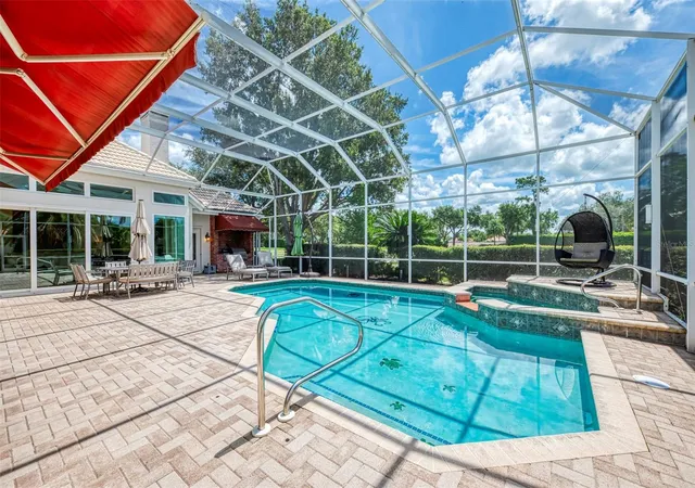 Photo 3 of Single family home for sale at 7767 Alister Mackenzie Dr, Sarasota, FL 34240 | MLS# A4701264 | Listing updated on 2026-09-13