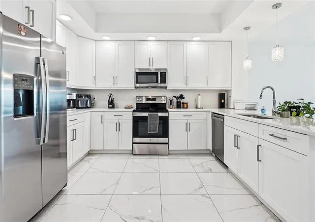 Photo 3 of Condo for sale at 415 Is Way #204, Clearwater Beach, FL 33767 | MLS# TB8533534 | Listing updated on 2026-10-03
