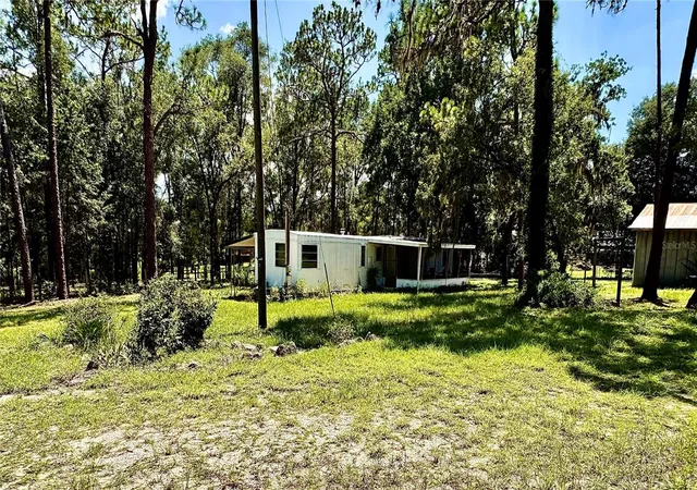 5th image of 10780 S Flutter Ter, Inverness, FL 34452 | MLS# OM729360